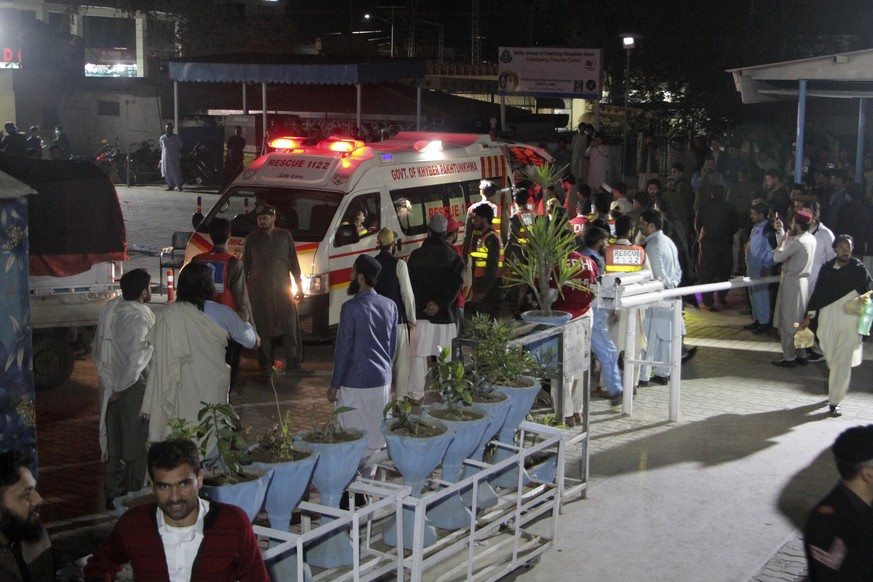 Rescue worker unload earthquake victims from an ambulance at a hospital in Saidu Sharif, a town Pakistan&#039;s Swat valley, Tuesday, March 21, 2023. A magnitude 6.5 earthquake rattled much of Pakista ...