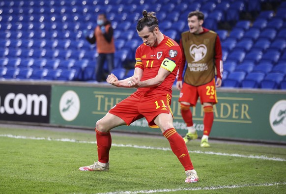 Wales' Gareth Bale celebrates his side's first goal of the game during the World Cup 2022 group E qualifying soccer match between Wales and Czech Republic at Cardiff Stadium, Cardiff, Tuesda ...