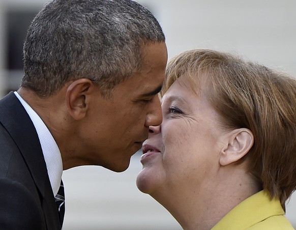 FILE - In this April 24, 2016n file photo,German Chancellor Angela Merkel, right, welcomes U.S. President Barack Obama at Herrenhaus Palace in Hannover, northern Germany. Angela Merkel has just about  ...