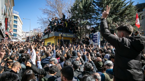 epa11257063 People protest a decision to revoke the mandate of newly elected oppposition party mayor Abdullah Zeydan, in Van, eastern Turkey, 03 April 2024. Zeydan, who is from a pro-Kurdish Equality  ...