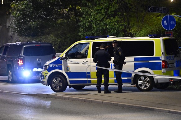 epa11636596 Police work outside the Israeli embassy in Stockholm, Sweden, 01 October 2024, after a suspected shooting near the embassy. According to the local TV4 Nyheterna media, a loud bang was hear ...