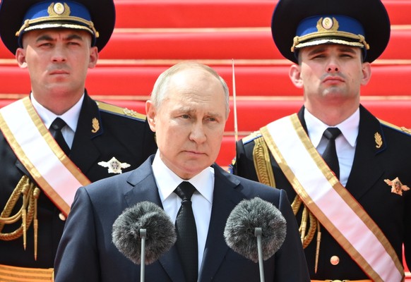 epa10713498 Russian President Vladimir Putin addressing units of the Russian Defence Ministry, the Russian National Guard Troops (Rosgvardiya), the Russian Ministry of Internal Affairs (MVD), the Russ ...