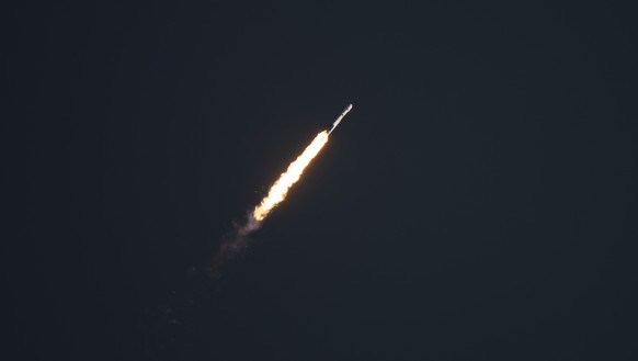 epa13199968 A handout picture made available by the National Aeronautics and Space Administration (NASA) shows a SpaceX Falcon Heavy rocket launching with NASA's Nancy Grace Roman Space Telescope ...