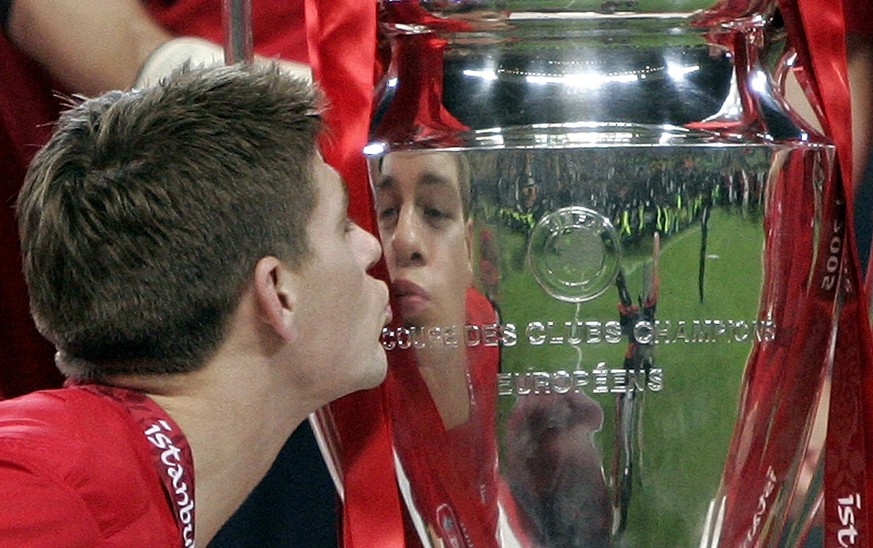 Liverpool&#039;s captain Steven Gerrard kises the trophy after Liverpool&#039;s victory in the the UEFA Champions League Final between AC Milan and Liverpool at the Ataturk Olympic Stadium in Istanbul ...
