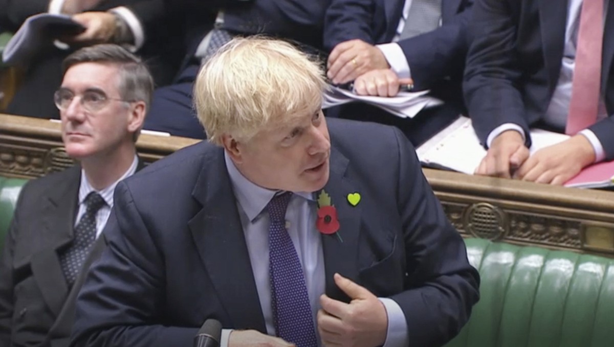 Britain's Prime Minister Boris Johnson speaks during Prime Minister's Questions in the House of Commons, London, Wednesday, Oct. 30, 2019. Johnson and opposition leader Jeremy Corbyn are gea ...
