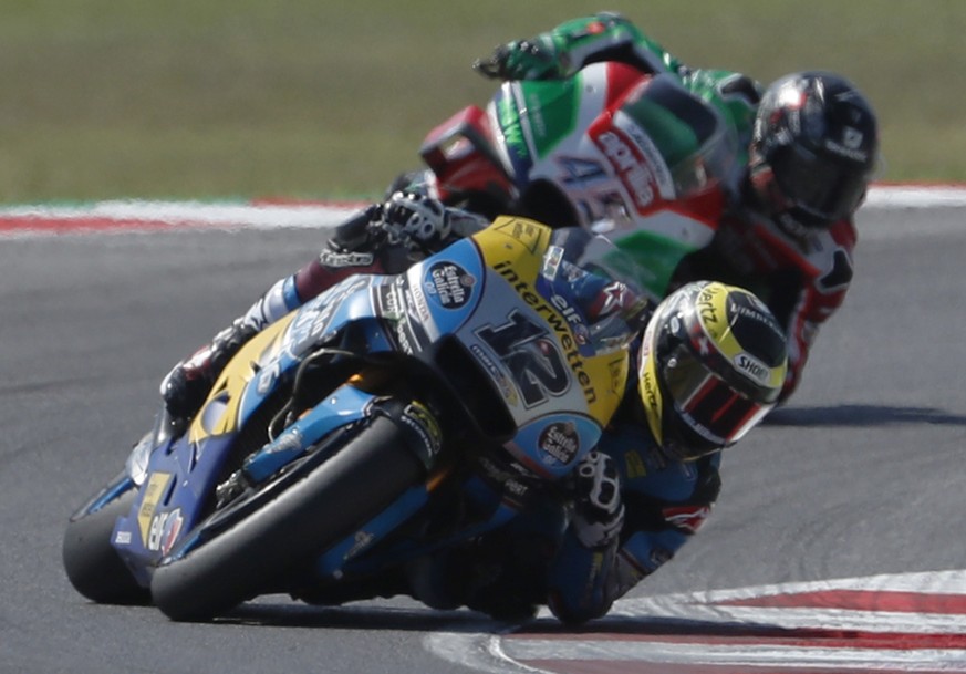 Switzerland&#039;s Thomas Luthi leads Britain&#039;s Scott Redding during the San Marino Motorcycle Grand Prix at the Misano circuit in Misano Adriatico, Italy, Sunday, Sept. 9, 2018. (AP Photo/Antoni ...