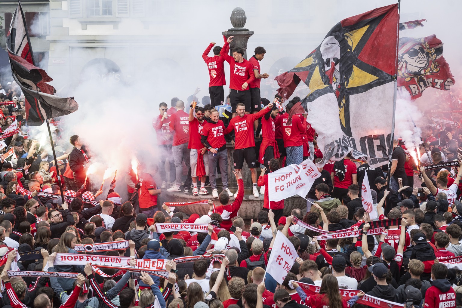 epa12930503 FC Thun fans celebrate the Swiss Super League championship title with the team in the Rathausplatz in Thun, Switzerland, 03 May 2026. FC Thun won the Swiss Super League to claim their firs ...