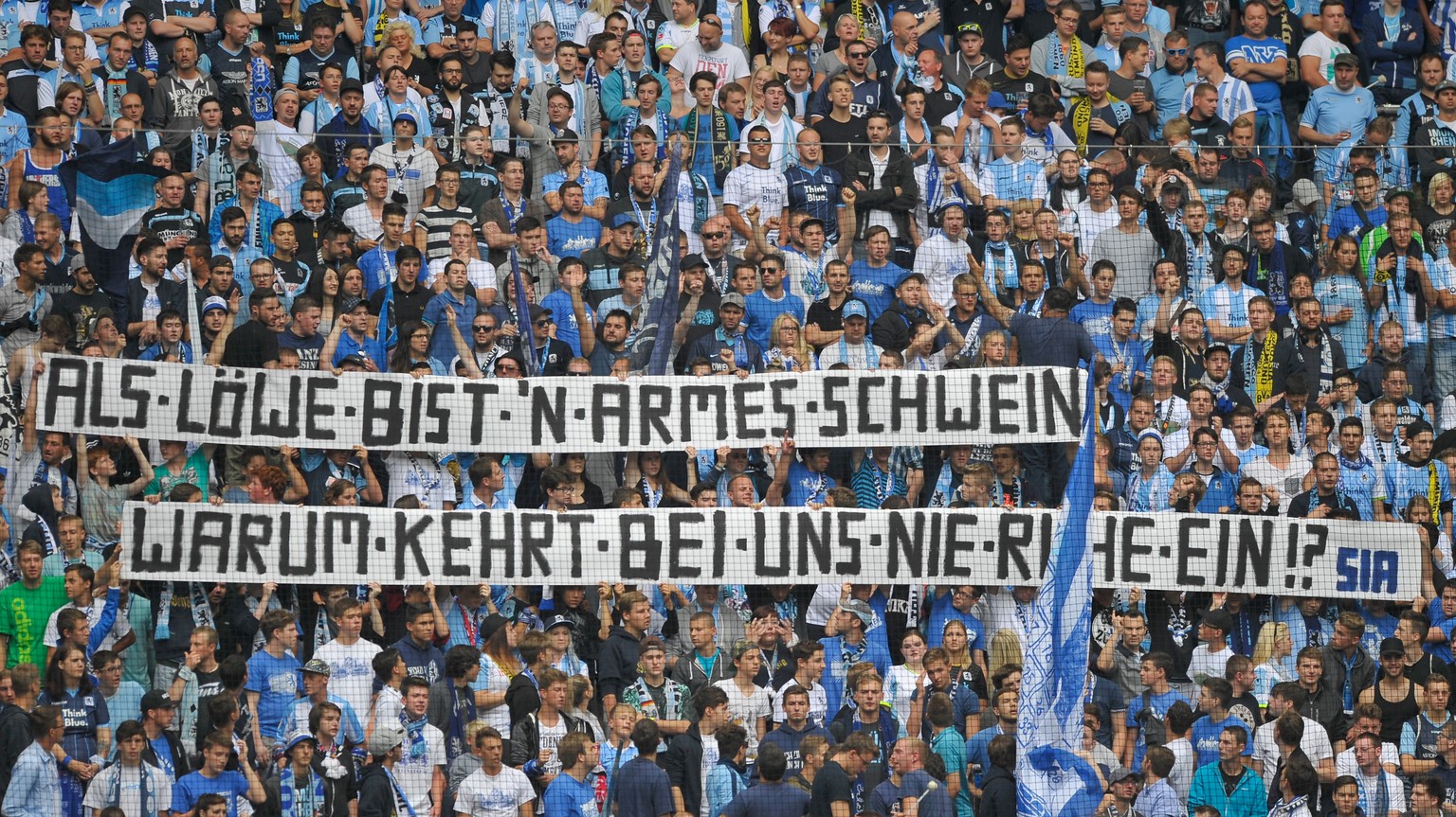 MUNICH, GERMANY - AUGUST 01: Fans of TSV 1860 Muenchen display a banner during the 2. Bundesliga match between TSV 1860 Muenchen and SC Freiburg at Allianz Arena on August 1, 2015 in Munich, Germany.  ...