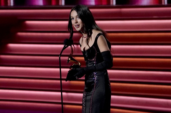 Olivia Rodrigo accepts the award for best pop vocal album for &quot;Sour&quot; at the 64th Annual Grammy Awards on Sunday, April 3, 2022, in Las Vegas. (AP Photo/Chris Pizzello)
Olivia Rodrigo