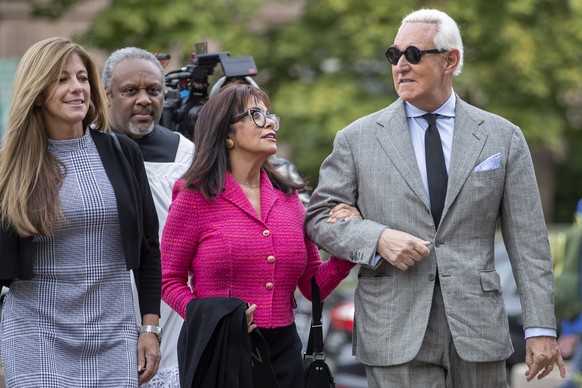 epa07978822 Roger Stone (R), former advisor to US President Donald J. Trump, arrives with his wife Nydia (C) and daughter Adria (L) for his trial at DC Federal District Court in Washington, DC, USA, 0 ...