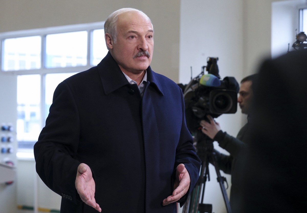 Belarusian President Alexander Lukashenko speaks to journalists as he visits the Dobrush Paper Factory in Dobrush, Belarus, Tuesday, Feb. 4, 2020. Lukashenko boasted about Belarus' warmer ties wi ...