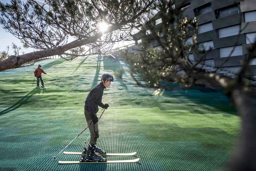 epa07364521 A skier at the Amager Bakke / Copen Hill, artificial skii slope on top of an incinerator plant which opened to the public in Copenhagen, Denmark, 12 February 2019. The ski slope and recrea ...