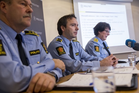 epa06355517 Norwegian police officials from L-R Aslak Finvik, Oeyvind A. Rengard and Tone Vangen talk to media at a press conference in Hamaroy, Tysfjord, Norway, 28 November 2017. According to report ...