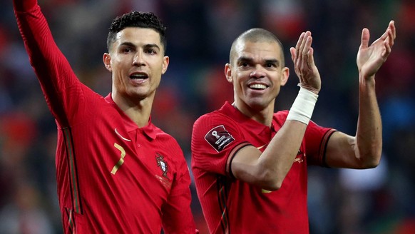 IMAGO / NurPhoto

Portugal v North Macedonia: 2022 FIFA World Cup, WM, Weltmeisterschaft, Fussball Qualifier Portugal s forward Cristiano Ronaldo (L) and Pepe celebrate the victory at the end of the 2 ...