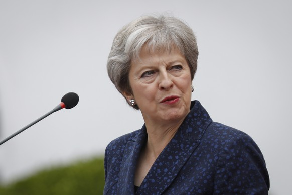 epa06983514 British Prime Minister Theresa May looks on during a joint news conference with Kenyan President Uhuru Kenyatta (not seen) at the State House in Nairobi, Kenya, 30 August 2018. May, who is ...