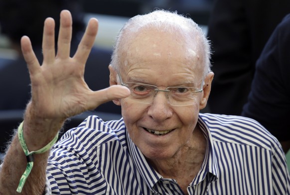 FILE - Former Brazilian player and head coach Mario Zagallo arrives to attend the World Cup final soccer match between Germany and Argentina at the Maracana Stadium in Rio de Janeiro, Brazil, July 13, ...