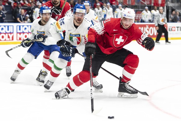 Italy`s Stefano Marchetti , left, agaist Switzerland&#039;s Kevin Fiala during the game between Switzerland and Italy, at the IIHF 2019 World Ice Hockey Championships, at the Ondrej Nepela Arena in Br ...