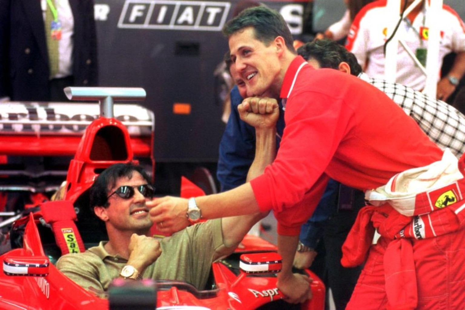 Sylvester Stallone und Michael Schumacher, 1998.