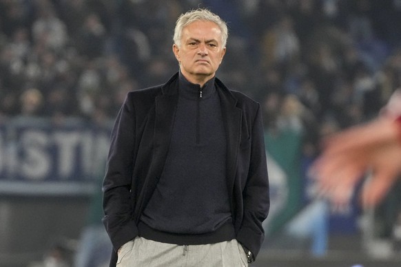 FILE - Roma&#039;s head coach Jose Mourinho stands on the pitch during his team&#039;s warm up ahead of the quarterfinal Italian Cup soccer match between Lazio and Roma at Rome&#039;s Olympic Stadium, ...