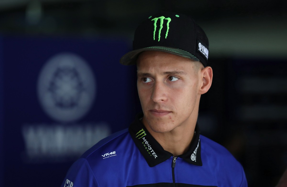 epa10874077 French rider Fabio Quartararo of team Monster Energy Yamaha at the team garage in Dankaut, near Greater Noida, India, 21 September 2023. The inaugural Motorcycling Grand Prix of India is h ...