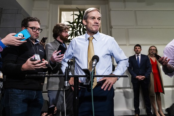 epaselect epa10929493 Republican lawmaker from Ohio Jim Jordan (C) speaks to reporters after House Republicans voted him out of contention to be the next Speaker of the House, in the US Capitol in Was ...