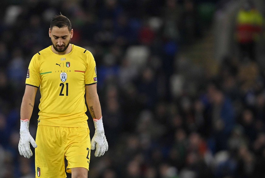 epa09584294 Italy?s goalkeeper Gianluigi Donnarumma reacts during the FIFA World Cup 2022 group C qualifying soccer match between Northern Ireland and Italy in Belfast, Britain, 15 November 2021. EPA/ ...