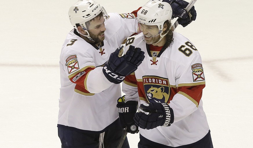 Florida Panthers defenseman Keith Yandle (3) and right wing Jaromir Jagr (68), from the Czech Republic, celebrate after the team&#039;s NHL hockey game against the San Jose Sharks in San Jose, Calif., ...