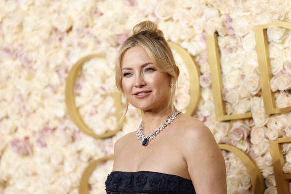 epa11809188 Kate Hudson arrives for the 82nd annual Golden Globe Awards ceremony at the Beverly Hilton Hotel in Beverly Hills, California, USA, 05 January 2025. Artists in various film and television  ...
