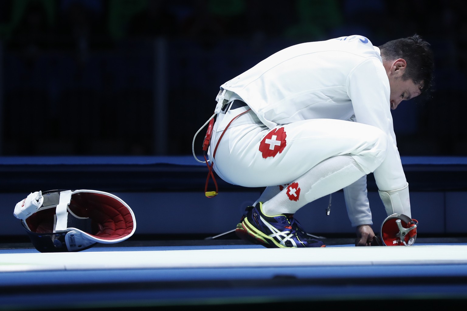 Switzerland&#039;s Fabian Kauter reacts after losing his match against France&#039;s Yannick Borel in the men&#039;s epee individual round of 16 in the Carioca Arena 3 in Rio de Janeiro, Brazil, at th ...