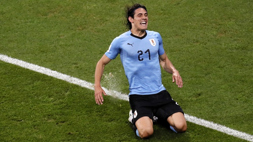 epaselect epa06853024 Edinson Cavani of Uruguay celebrates scoring the opening goal during the FIFA World Cup 2018 round of 16 soccer match between Uruguay and Portugal in Sochi, Russia, 30 June 2018. ...