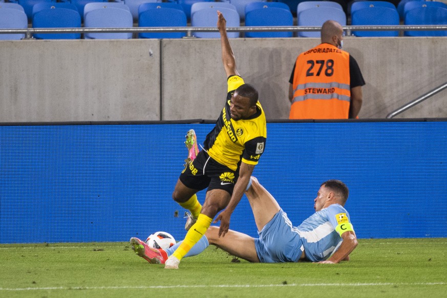 Slovan Bratislava&#039;s Jaromír Zmrhal, right, duels for the ball with Young Boys Bern&#039;s Mohamed Ali Camara during the Champions League second qualifying round, first leg soccer match between Sl ...