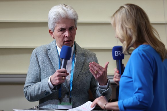 epa10475223 German politician Marie-Agnes Strack-Zimmermann (L) gives an interview as she attends the 2023 Munich Security Conference (MSC) in Munich, Germany, 18 February 2023. The Munich Security Co ...