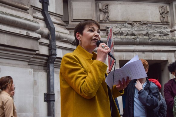 May 24, 2022, London, England, United Kingdom: Green Party MP CAROLINE LUCAS speaks to protesters. Extinction Rebellion activists disrupted oil giant Shell s Annual General Meeting at Methodist Centra ...