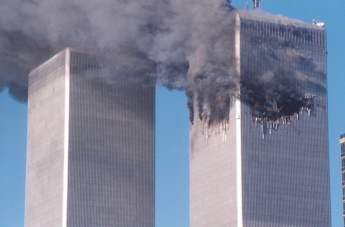 Both towers of the World Trade Center burn on 9/11 xkwx 9/11, airline, airplane, attack, building, crash, danger, destruction, explosion, fire, fireball, hijacking, history, hit, impact, lower manhatt ...