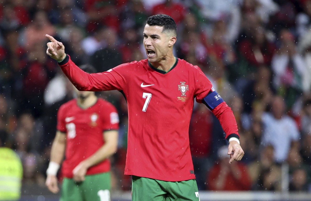 Portugal's Cristiano Ronaldo gestures during the UEFA Nations League soccer match between Portugal and Poland at the Dragao stadium in Porto, Portugal, Friday, Nov. 15, 2024. (AP Photo/Luis Vieir ...