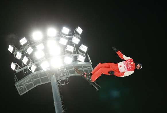 epa09761677 Noe Roth of Switzerland in action during a practice round for the Men&#039;s Freestyle Skiing Aerials final at the Zhangjiakou Genting Snow Park at the Beijing 2022 Olympic Games, Zhangjia ...