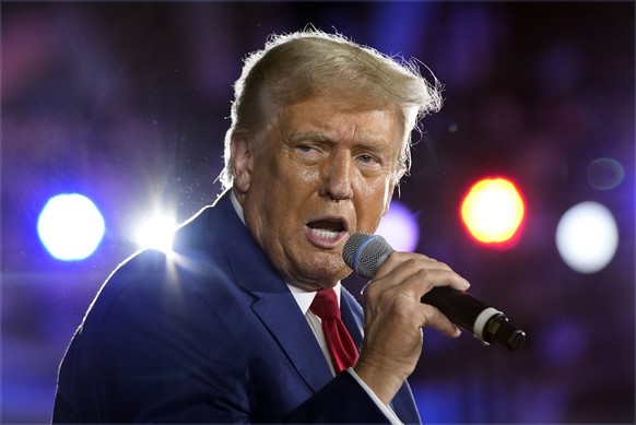 FILE - Republican presidential nominee former President Donald Trump speaks at a town hall campaign event at Macomb Community College, on Sept. 27, 2024, in Warren, Mich. (AP Photo/Alex Brandon, File) ...