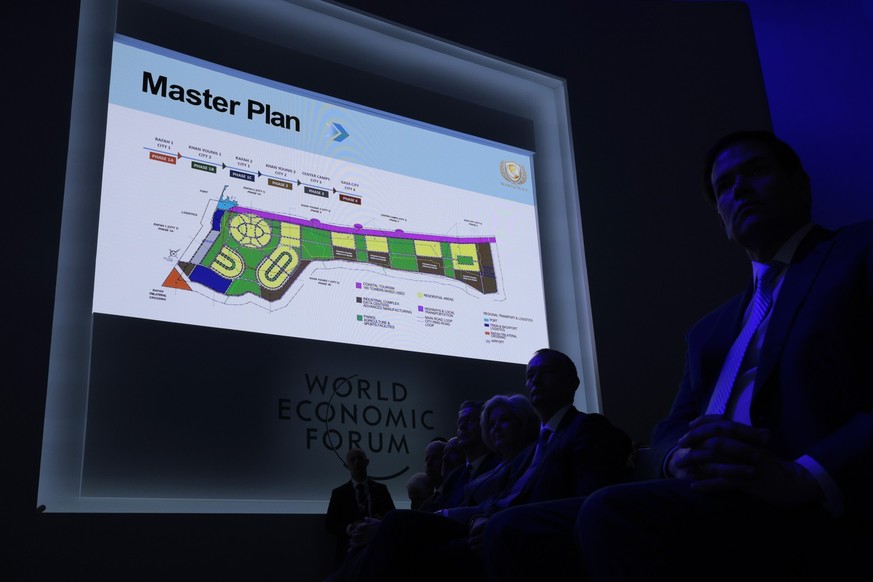 DAVOS, SWITZERLAND - JANUARY 22: A plan for the reconstruction of Gaza is shown on-screen after the U.S. President Donald Trump presented the “Board of Peace” at the World Economic Forum (WEF) on Janu ...