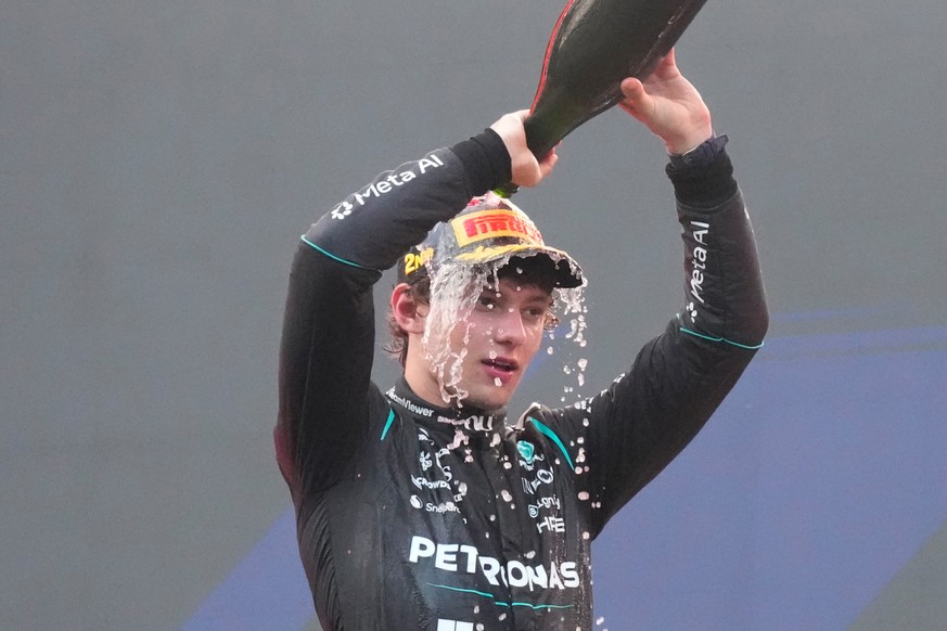 Mercedes driver Andrea Kimi Antonelli of Italy celebrates his second place on the podium the Bahrain Grand Prix in Sepang, Malaysia, Sunday, Oct. 4, 2026. (AP Photo/Aijaz Rahi)
Andrea Kimi Antonelli