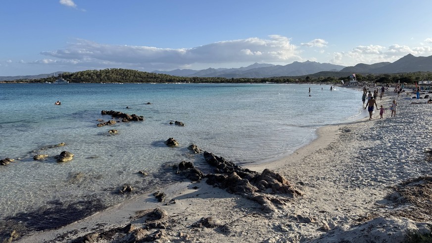 Sardinian beaches captured in striking drone footage during peak season SARDINIA, ITALY - AUGUST 7: An aerial view shows visitors flocking to Sardinias famous beaches, including the crystal-clear wate ...