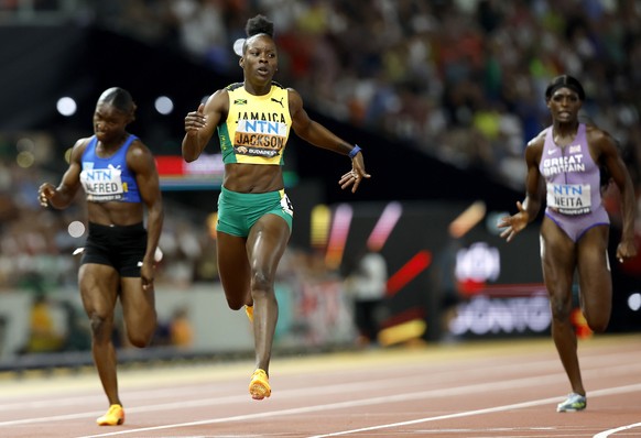 epa10820388 Shericka Jackson of Jamaica wins the Women&#039;s 200m final at the World Athletics Championships Budapest, Hungary, 25 August 2023. EPA/ROBERT GHEMENT