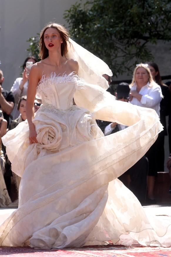 epa13257676 A model presents a creation from the Women's Spring/Summer 2027 collection of Italian fashion house Antonio Marras during Milan Fashion Week, in Milan, Italy, 23 September 2026. Milan ...