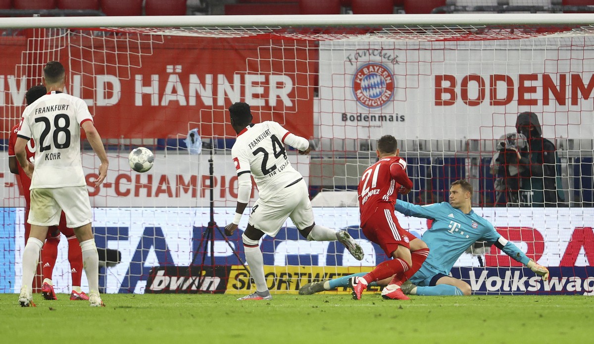 Eintracht Frankfurt's Danny da Costa scores their first goal during the German soccer cup semi-final match between Bayern Munich and Eintracht Frankfurt in Munich, Germany, Wednesday, June 10, 20 ...