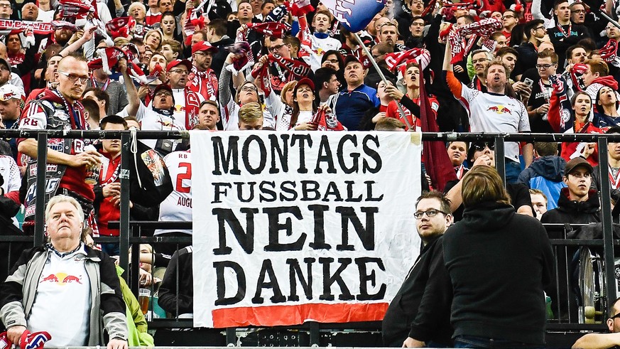 epa06657777 Leipzig fans protest against Bundesliga matches being played on Monday before the German Bundesliga soccer match between RB Leipzig and Bayer Leverkusen in Leipzig, Germany, 09 April 2018. ...