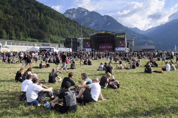 epa06791968 Festival goers attend the concert of the English metal band Asking Alexandria on the main stage (Jungfrau stage), during the Greenfield Openair Festival in Interlaken, Switzerland, 07 June ...