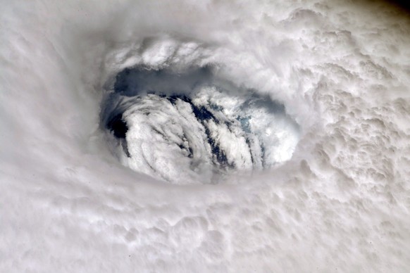 epa07814007 A handout photo made available by NASA shows an image of Hurricane Dorian&#039;s eye taken by NASA astronaut Nick Hague, from aboard the International Space Station (ISS), 02 September 201 ...