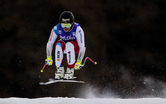 Switzerland's Lara Gut goes airborne during a training session of the alpine skiing, women's World Cup downhill in Cortina d'Ampezzo, northern Italy, Wednesday, Jan. 17, 2018. (AP Photo ...