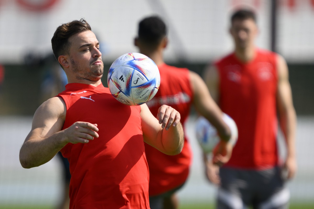 Switzerland's midfielder Xherdan Shaqiri plays with a ball during a closed training session of Swiss national soccer team in preparation for the FIFA World Cup Qatar 2022 at the University of Doh ...