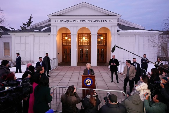 Former Secretary of State Hillary Clinton speaks outside the Chappaqua Performing Arts Center, after testifying before U.S. House lawmakers as part of a congressional investigation into convicted sex  ...