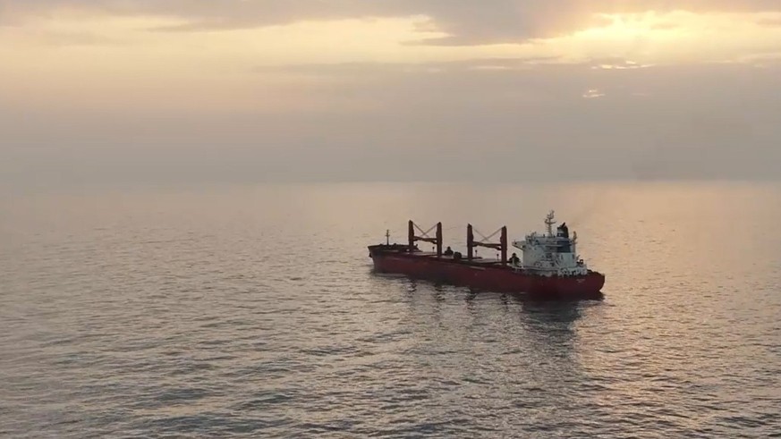 epa12225447 A screen grab taken from a handout video released by the Houthis military media center on 08 July 2025 shows the Liberian-flagged bulk carrier, the Magic Seas, sinks after being attacked i ...